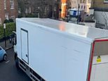 'Whole Foods has turned our Chelsea street into an industrial estate': Wealthy residents say 'army' of HGV delivery trucks are demolishing walls, ripping down trees and ruining pavements