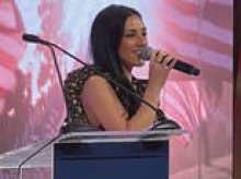 Kash Patel's girlfriend belts out the national anthem for adoring boyfriend and Trump allies