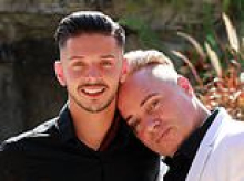 One of Britain's 'first gay dads' and his husband are charged with rape, sexual assault and modern slavery trafficking for sexual exploitation