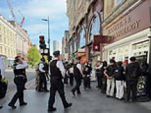 TikTokers mob Scientology buildings as viral 'speed run' stunt comes to UK: Moment youths descend on church's London HQ in bid to sprint inside