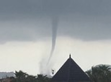 Roads become rivers in southern Spain as freak storms, water spouts and flash floods hit holiday hotspots