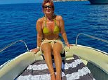 Building society cashier is jailed for stealing thousands from vulnerable customers after she was caught out by Facebook pictures of her lavish holidays