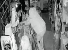 Moment professional footballer smashes up antique shop in £7,000 drunken rampage