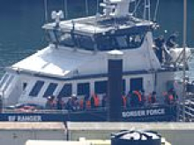 SUE REID: The moment Britain's 200,000th Channel migrant landed in Dover after being 'plucked from rubber boat'
