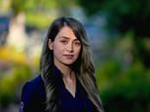 Glamorous doctor, 33, moans about being denied a green card and blames 'retaliation' after demanding answers about her application