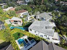 Mansion war ends as millionaire jailed for building $1m pickleball court and guest house in his mansion garden is freed - but he must now DEMOLISH the lavish extension