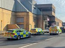 Car ploughs into pedestrians on busy street with several rushed to hospital including one fighting for life as police launch hunt for driver
