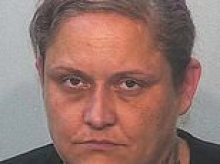 Purple-haired mom 'abandoned three children and dogs home alone for MONTHS in squalid conditions'