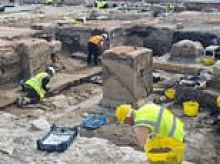 Archaeologists digging up bowling alley make 'significant' 13th century discoveries before it is turned into a car park