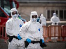 Evacuation of rat virus cruise FINALLY under way despite furious protests from locals... but Americans are forced to wait on board