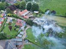 Man, 91, dies in bungalow garage fire after neighbours heard 'loud explosions'