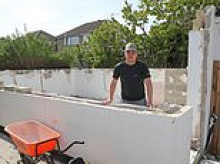 Son who built a garden annexe for his dying father is ordered to tear it down after neighbours complained it blocked their light
