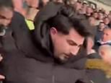 Shocking moment Arsenal fan is thrown down stadium steps after angering West Ham supporters by sitting in home end