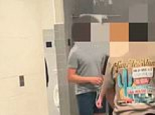 Notoriously woke Virginia school district hit by third transgender scandal as student is accused of photographing FORTY schoolmates under bathroom stall