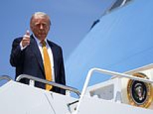 Trump is AIRBORNE to China without Melania to face high-stakes summit amid Iran war: List reveals family members and Cabinet secretaries aboard Air Force One