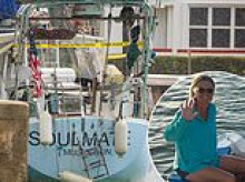 Coast Guard raids couple's yacht day after seizing it on the high seas seeking evidence of crime after wife 'fell overboard' off remote Bahamas island