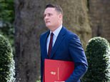 Put up or shut up, Starmer tells his Cabinet rebels... but four ministers quit their jobs
