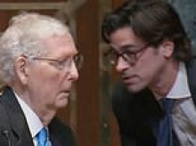 Awkward moment an aging Mitch McConnell needs help from staff during hearing with Pete Hegseth