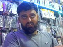 The High Street shops taking payments for people smugglers: Moment UK phone store worker offers to take '£3k in cash' for a small boat migrant crossing