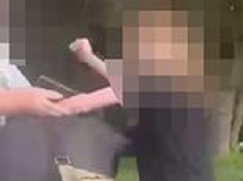 Shocking moment girl, 14, rains punches down on boy and demands he hand over his bag at weekend netball match attended by families