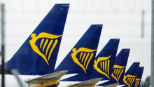 Ryanair z rastjo letnega dobička opozarja na naraščajoče stroške