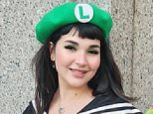 Luigi Mangione superfan who taunted his victim's family outside court is revealed to be the daughter of a senior CVS healthcare boss