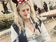 Glamorous on-the-run 'dine and dash' ex-lawyer posts pictures of herself enjoying a trip to Disneyland Paris as it's revealed she has moved to France - despite facing four UK arrest warrants