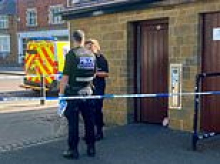 Woman's body is found in public toilet near historical landmark in Banbury - as police launch probe into her death