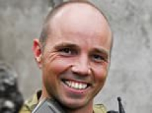 Troubled former military officer is revealed as the armed man shot dead by police outside suburban Brisbane home