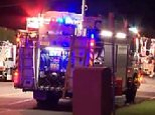 Woman and boy are stabbed and left for dead in burning house - as teenager fights for life in hospital