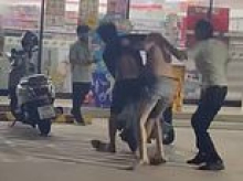British tourist is attacked by locals after he's accused of trying to steal a drink from Thai supermarket