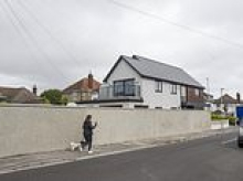 Sandbanks residents turn on neighbour who erected 7ft tall concrete boundary that 'looks like the Berlin Wall' at his £1million two-storey house