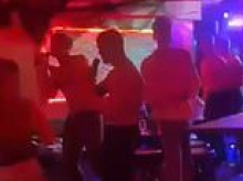 Moment topless drunk marines twerk and sing karaoke hours before one of them kills man with single punch - and is set to walk free after 'lenient' 17 months behind bars
