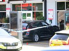 Boy, 8, among three rushed to hospital after BMW ploughs into picnic table at motorway services