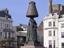 Bank Holiday prankster places giant Walnut Whip chocolate bar on head of Queen Victoria