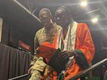 Heartwarming moment Air Force father returns from Japan to surprise son on stage at high school graduation
