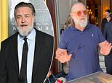 Angry Russell Crowe scolds fans waiting for his autograph outside Paris hotel: 'Don't f***ing push in on me'