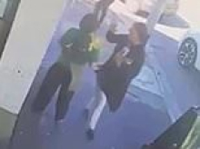 Arrest made after waitress visiting Melbourne on a working holiday had a 'plate smashed into her face' by a stranger as she served customers