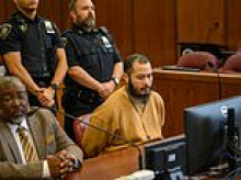 Rosary-wearing murderer hangs head in shame as he's jailed for fatal stabbing spree on Manhattan block