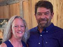 Wife killed by flying umbrella while eating at lakeside restaurant during freak weather episode