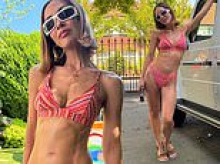 Myleene Klass poses in vibrant orange bikini in sizzling snaps during bank holiday heatwave