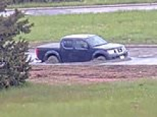 Idiot truck driver learns costly lesson after physically removing 'road closed' barrier and plowing vehicle into deep wet concrete