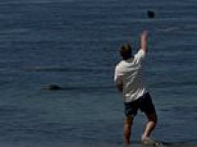 Vile tourist who hurled rock at Hawaiian seal then bragged about his wealth is being persecuted because he is WHITE, lawyer claims