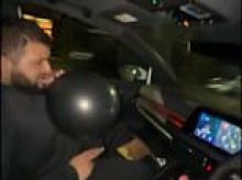 Two men who filmed themselves speeding at 139mph in a 30mph zone while inhaling from balloons before crashing into car and killing the driver are jailed for total of 23 years