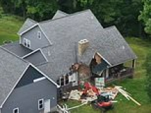 Home wrecker accused of tearing down house with heavy machinery while his family was inside after epic drunk fight with wife
