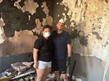 Newlywed couple are left homeless after huge fire 'caused by extension lead' tore through their maisonette