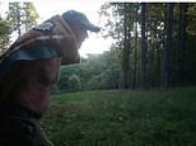 Fears as 'armed and dangerous' fugitive on the run for killing a cop is spotted on trail cam in North Carolina
