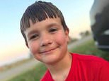 'Bravest little boy in America,' 8, dies trying to save his mother's life in selfless act that has broken small town's heart