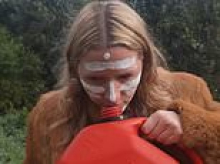Comedian who appeared in satirical video as an Aboriginal woman sniffing petrol reveals she has been fired from her job as she blasts the clip being removed under a copyright claim