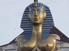 He sphinx it's all over! Former owner of Hearts FC installs busty Egyptian-style golden statue on top of his house